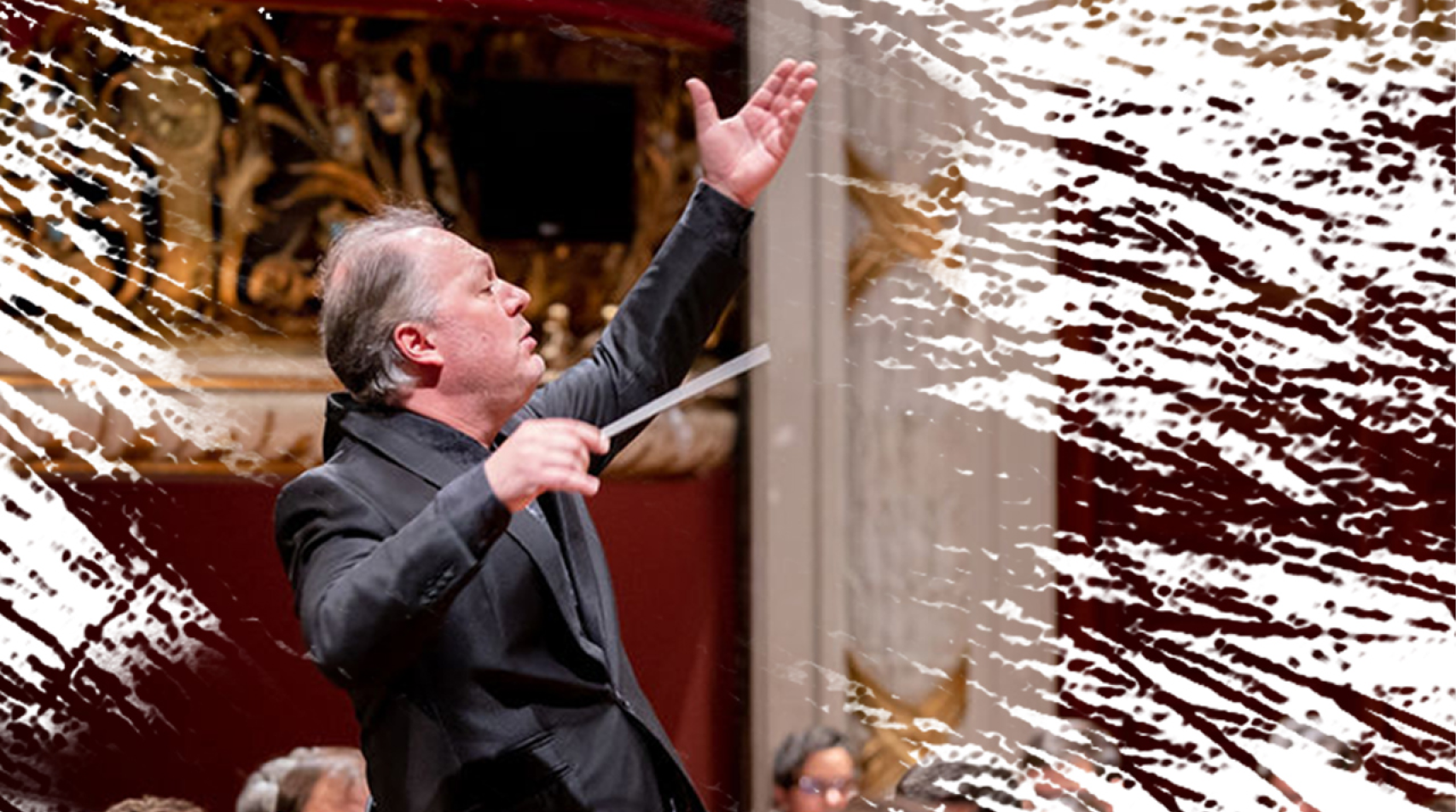 Foto de maestro regendo durante concerto